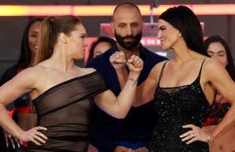 Ronda Rousey mengalahkan Gina Carano dalam waktu kurang dari 20 detik
