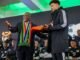 Kekacauan visa menunda keberangkatan Bafana Bafana karena McKenzie menuntut jawaban