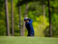 McIlroy masih mengejar saat Rahm mulai kuat pada hari Minggu