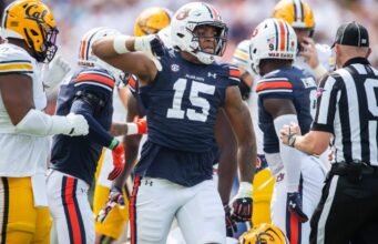 Titans Ink DE Keldric Faulk, penandatanganan kelas pemula penuh
