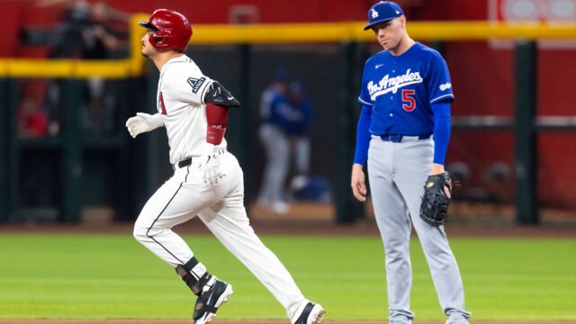 Dodgers menangkis upaya kembalinya Diamondbacks dengan peringatan dari Nolan Arenado
