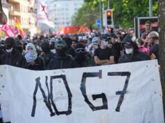 Bentrokan saat ribuan orang melakukan protes di Jenewa menjelang KTT G7 di Prancis