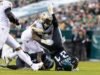 Titans menandatangani DE Jalyn Holmes