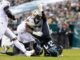 Titans menandatangani DE Jalyn Holmes